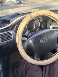 أوبتيما ٢٠١٠ • مكينة ٢٠٠٠ • رقم بصرة