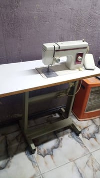 مكينة خياطة • مبردة دكت • مغسلة
