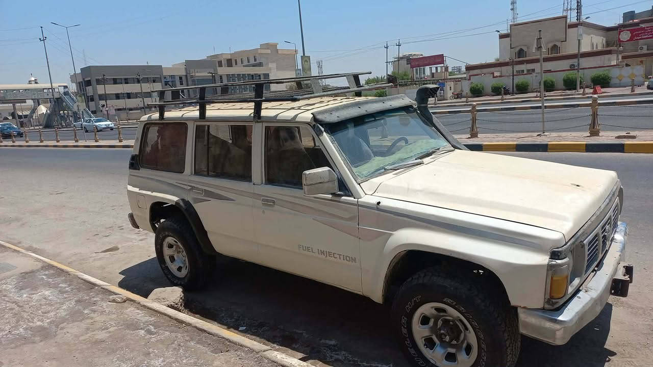 نيسان موديل ١٩٩١ رقم بغداد دولي سنويه لغايه ٣٠ السعر ٥٠ وبيها مجال قليل ***********مكاني ميسان
