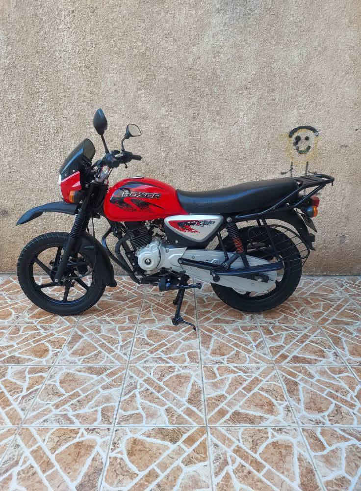السلام عليكم شباب 
بوكسر للبيع
موديل 2021 شهر 12
 نازله 2023 
دراجه زيرو 
مكفوله كفاله عامه 
دراجه رقم وسنويه ديالى
 تحويل ثاني يوم 
مكاني ديالى خالص
 الشراي يتصل على هذا الرقم ***********
