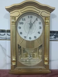 ساعة جدارية • ٦٠ سم • شغالة