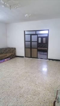 بيت للبيع  حي العامل الثانية قرب جامع الزهراء مساحة البيت 237م ركن طاب...