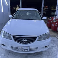 نيسان سني موديل 2010  السياره بيها بارد باب الامامي وباب الخلفي جهه ال...