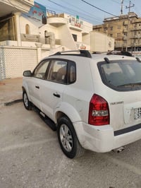 توسان ٢٠٠٩ • مكينة وكير نظيف • ضربة باب السايق