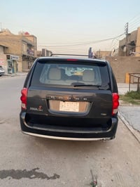 دوج كرفان 2012 فول بيبان سلايد   محرك 3600 /6 سلندر  رقم بغداد بسمي  س...