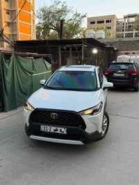 كورلا كروس 2025 فول 1/1 مكفوله رقم بغداد باسمي ماشيه8 الف 5 كامرات جنط...