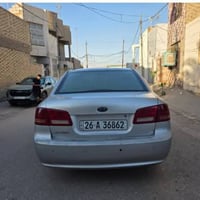 اوبتيما 2009 • محرك 2000 • كفاله من الصبغ