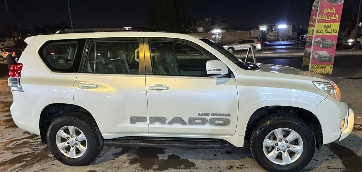 السلام عليكم ورحمة الله ، لبيع برادو 2011 (لبيع فقط بدون مراوس)ابيض (رقم بصره إنكليزي مميزه )كويتي فول 
السياره جديده ،
المواصفات فول ١/١ محرك 6 سلندر (4000) ، مكفوله كلشي حته دعاميات محرك كير كفاله على وضعيته الشركة ، صدر جديد + تخم تاير جديد + تخم دسكات ،ونعومته خير من الله ، الموصفات كويتي ، فول 
فتحه سلايت 
بصمه ونظام ترحيب ،
١٠ ايرباك ،
دبل تانكي ،
هوك خلفي ، تبريد 3 قطعه + ثلاجه وسطيه ، 
مري شفط كهربائي ، حساس خلفي مع كامره خلفيه ،
تحكم استيرن جهتين ،
كروز سرعه ،
داخل صاج ملكي دركه صاج ،
كشنات جلد  ،٧ راكب ، 
سبير  تعلليك ، 
دفع رباعي 4x4 ، (السعره 270 )وبيه مجال مكاني بغداد الكرادة ، اتصال او واتساب ***********
