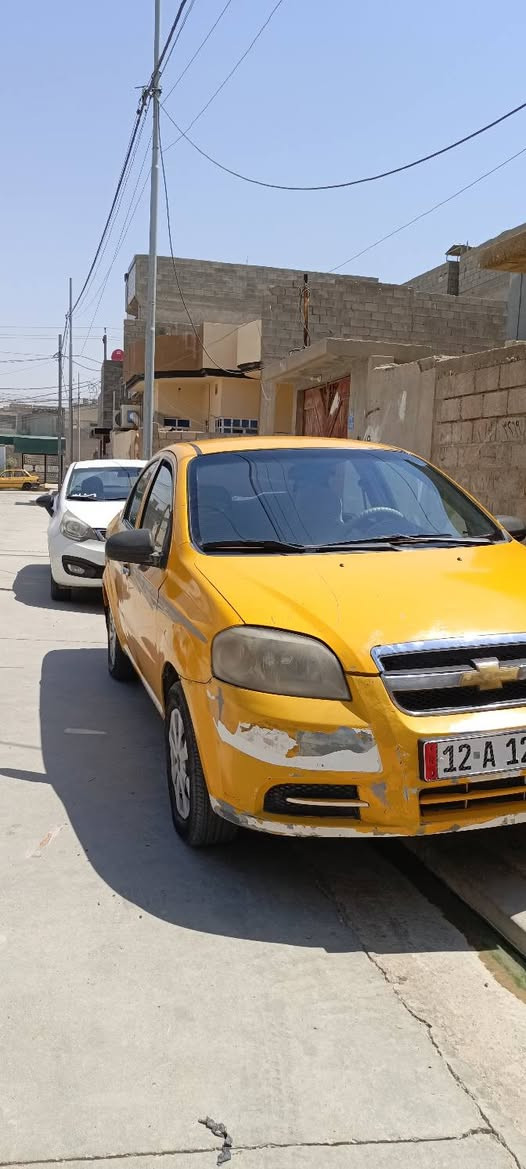 السلام عليكم  سيارة افيو 2009 كم شفتين محرك كير شرط  طخم تاير جديد باتري جديد تبريد وي السويج هيه غرمات صفر بيه طخه بل جاملق الخلفي الايمين راعيه الشرعي اني سعر 55 بيه مجال الرقم ***********    الموصل  جانب  الايمن
