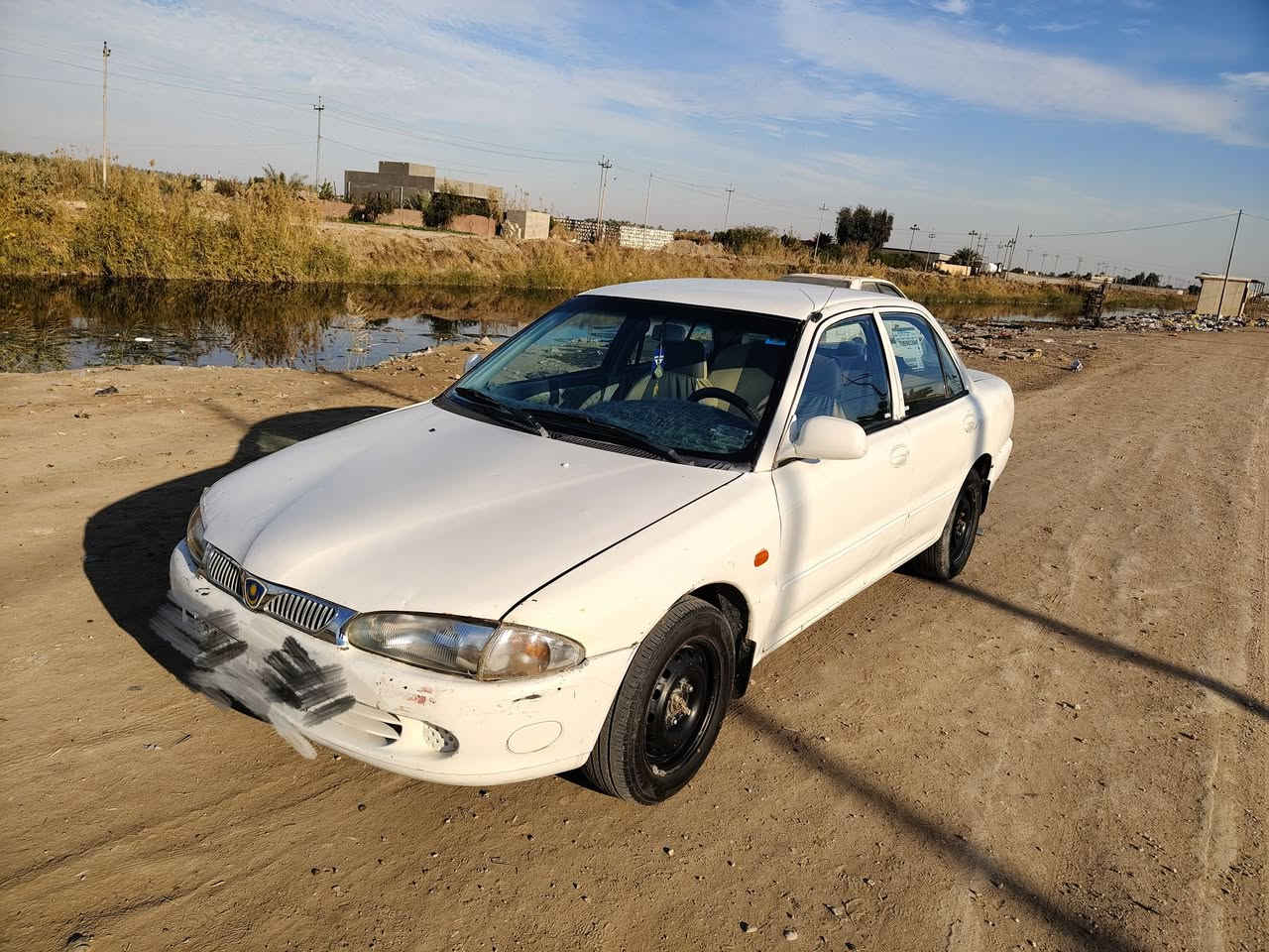 السلام عليكم بروتون للبيع موديل 2000 اوتماتيك مصبوغه عام للجماليه سنويه جديده رقم انكليزي باسمي 
السعر 35 
 مكانهه ديوانيه سياره جاهزه للاستفسار *********** يوجدواتساب
