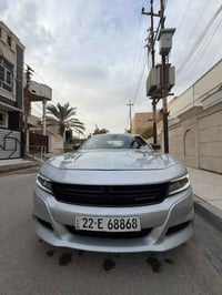 دوج جارجر 2019وارد كندي بدون حادث   مواصفات sxt  بصمه ابواب بصمه تشغيل...