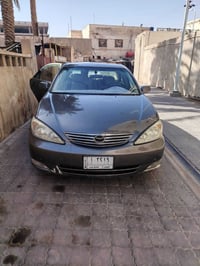 كامري 2004 وارد امريكي مبدل جاملقات خلفيه محرك 4 سلندر مصبوغه عام تبري...