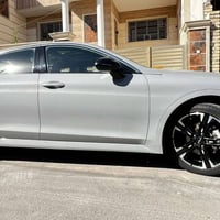 K5 2023  مواصفات جي تي لاين  اللون سمنتي  السيارة معوقين وبأسمي حادث ا...