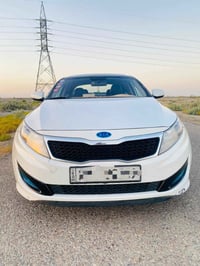 اوبتيما 2014 • بنزين • فتحتين بانوراما