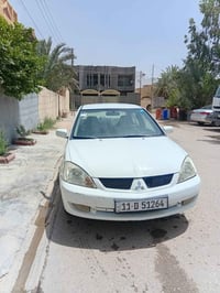 لانسر ٢٠١١ • ١٦٠٠ • رقم بغداد