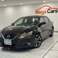 نيسان التما 2016  ماشي 103 mi مواصفات SR الضرر ربع بوند  السعر 115 مجا...