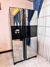 ثلاجة سامسونج أنيقة وفخمة بحالة ممتازة، تصميم بابين (Side-by-Side) مع ...