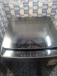 غسالة ملابس • ١٨ كيلو • موصل جديدة