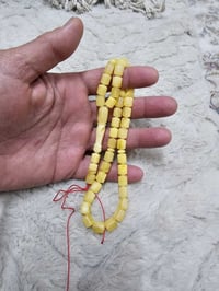 مسبحة • كهرب بحر البلطيق • ضمان مدى الحياة