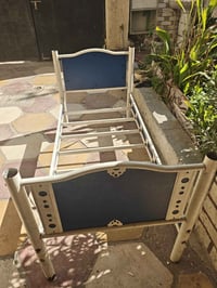 جرباية • ٢ قطع • خشب و حديد