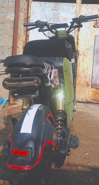 R9 • زيتونية • تبدل يده
