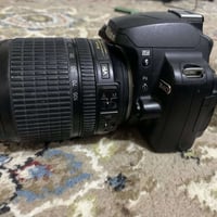 نيكون D40 • عدسة ١٨-١٠٥مم • شاحن وبطارية