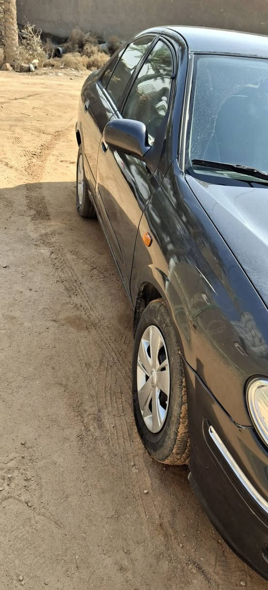 نيسان صني 2001 مكينه وكير وحداديه مكفولات مصبوغه حزام لاضربه ولاتبديل سنويه لل 28 سعر  70 وبيها مجال للشراي مكاني ديوانيه شاميه للتواصل *********** النجف, العراق
