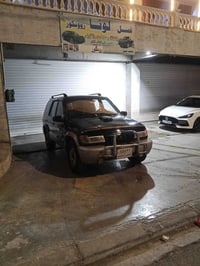 كيا سپؤرتاج موديل 2001گير مةكينة بة شةرت سةنةوي بةسةر چووة سبغ عامة پي...