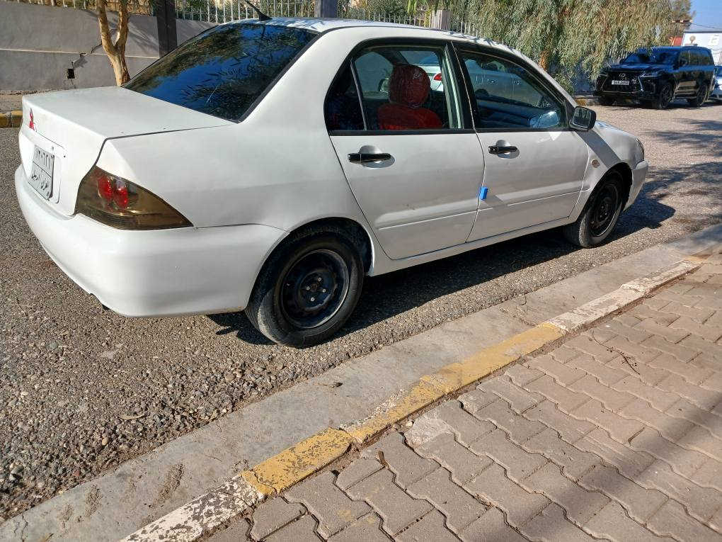 لانسر٢٠٠٧كيرعادى عام بوياغه ليدرانى قورسى نيه كيرمكينه تبريد تحويل به شه رت مكينه كه ميك بوخارى هه يه سه نه وى به سه ر جوه نرخ60ورقه *********** شقلاوة, أربيل
