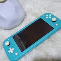 نينتندو سويتش لايت • شغال غير مضمون • مستعمل