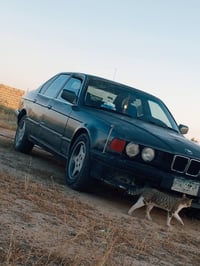BMW735موديل1991 رقم نينوى كير و محرك نضيفات صدر جديد غرفتها بل چيس جدي...