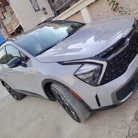 كيا سبورتج ٢٠٢٣ بدون رقم لون سمنتي فول اكس لاين كشنات جلد كهرباء تدفئة...