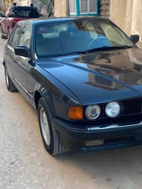 بي ام 735 موديل 91 رقم بغداد بأسمي السعر 58 مامتواجد على الفيس.  07702...