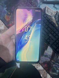 انفنكس نوت ١٢ • ١٢٨