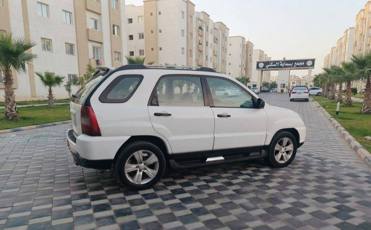 سبورتج 2009 سياره جديده كلش 
خليجي مكفولة 
من الضربة صبغ بنيد شخوط بدون دواخل والباقي كفاله عامه
بحالة جيدة جدا رقم بغداد الجديد السنوية بأسمي محرك كير مكفول مكاني بغداد
السعر مناسب جداً 103 الشراي يتصل على الرقم 
    ***********
