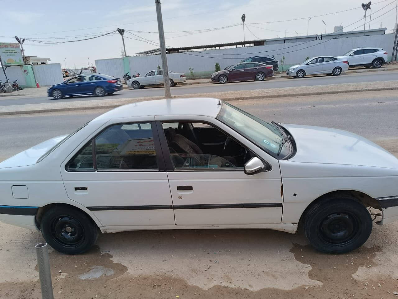 السلام بيجو٤٠٥ رقم انكليزي باسمي هزه جديده سنويه جديده مباشر مدوار *********** عنوان النجف ٣٠ورقة وبيه مجال حك الجيه
