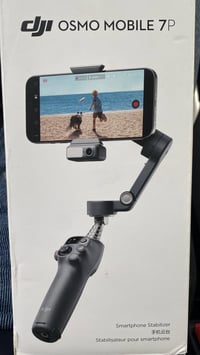 مانع اهتزاز اوزمو موبايل 7P شركة Dji مستخدم  سعره 200 الف و بي مجال  0...