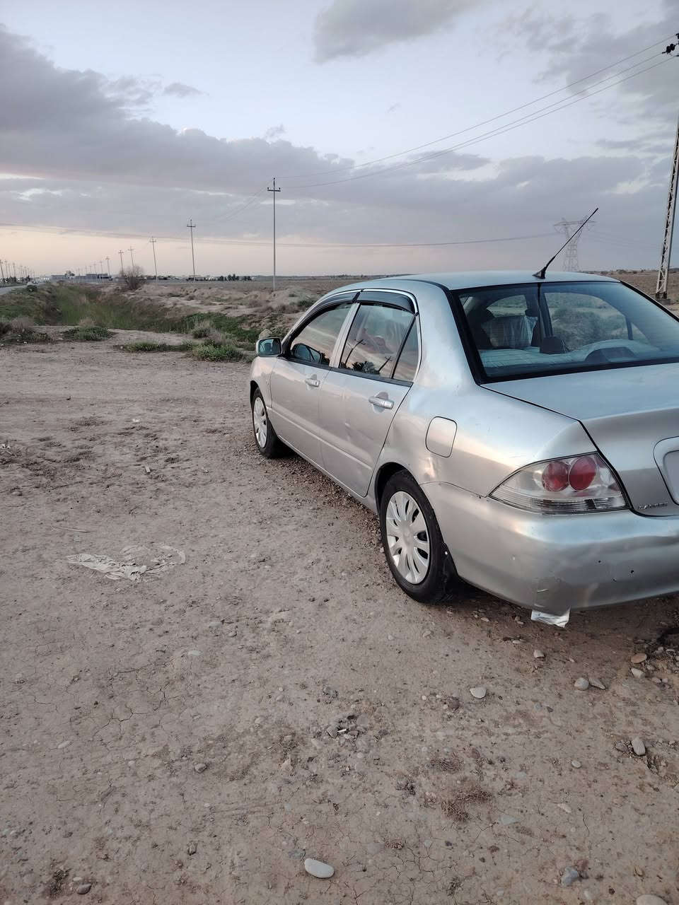 سلام عليكم لانسر 2011 للبيع رقم بغداد سنوية ما نافذة السيارة جديدة مال جناي السيارة بدون حادث بدون صبغ السونار مرفق مع الصور مكينة كير مكفولات صدر أمامي خلفي جديد تدفىة تبريد شغال تخم تاير داخل عسلي السيارة السيارة احلة من الصور كبل لشارع السعر (78) وبيها مجال مكان السيارة ديالى الشراي يتصل ***********
