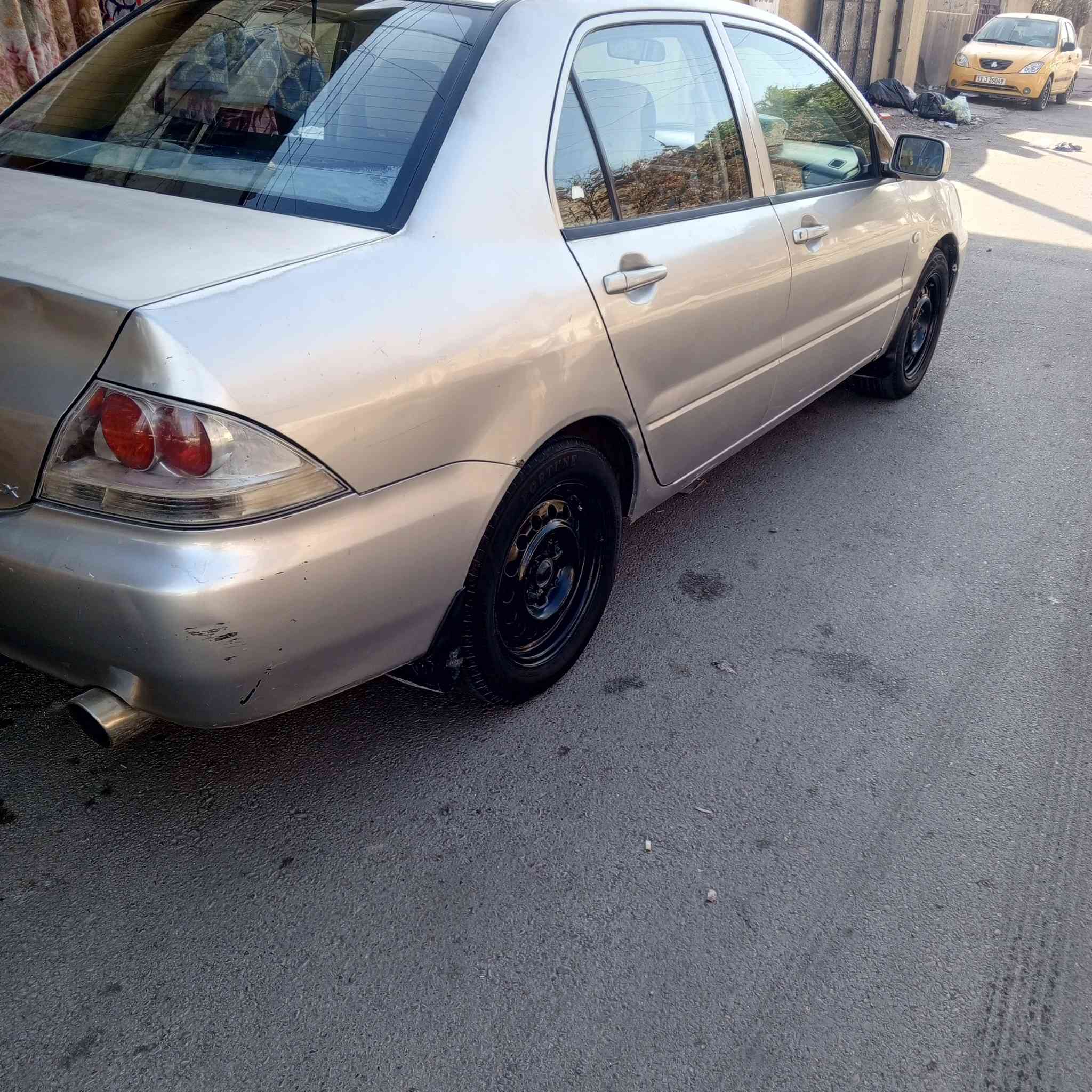 لانسر للبيع موديل 2009 رقم انكليزي بسمي داخله هزه  بيه جملغات الاماميه  والبنيد بس صبغ أثر جراد السياره السعر 78وبيه مجال حلوه مال جنايه مكاني الدوره ابودشير ***********
