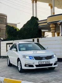 اوبتما 2010 • فتحة سقف • مكينة وكير جديد