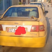 كوين للبيع موديل2010 كير ومكينة شرط  هيئة وغرامات صفر رقم انكليزي  سنو...