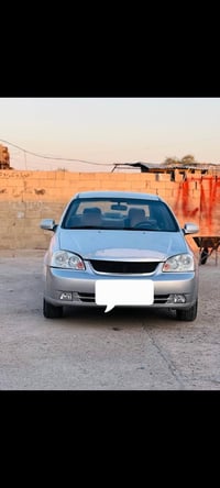 فورنزا موديل 8 رقم بغداد دولي باسمي هزة جديدة  السيارة ليبل واحد عدا ج...