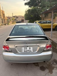 لانسر 2007 للبيع كير ومكينة جدد مكفولات تبريد مصبوغة عام جمالية بيها ط...