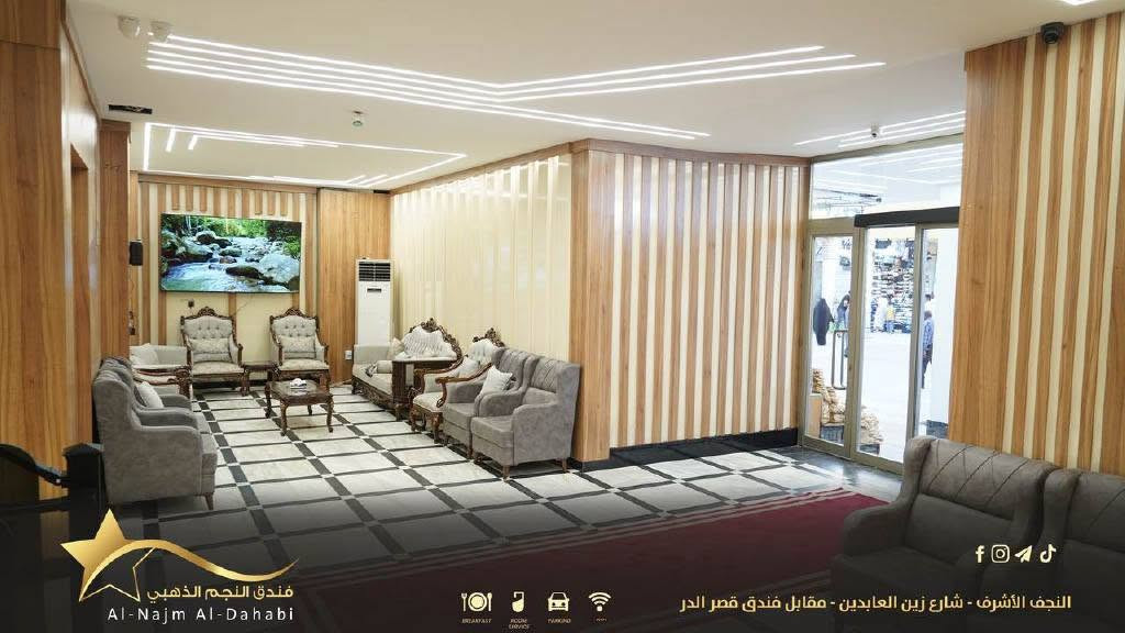 🏨 فندق النجم الذهبي السياحي 5 نجوم 

إذا تبحث عن الراحة والنظافة أثناء زيارتك للنجف الأشرف، فندق النجم الذهبي يرحب بيكم بكل سرور.

📍 الموقع: شارع زين العابدين  فقط دقيقه مشي عن الامام علي عليه السلام 

نوفر غرفًا:
🛏️ ثنائية
🛏️ ثلاثية
🛏️ رباعية

جميع الغرف:
❄️ مكيفة بالكامل
📶 مزودة بخدمة إنترنت (Wi-Fi)
🚿 تحتوي على صحيات (WC) خاصة
✨ نظيفة ومريحة، ومناسبة للعوائل والزائرين الكرام.

أهلاً وسهلاً بكم، ونسعد بخدمتكم ونتمنى لكم إقامة مريحة ومميزة في فندق النجم الذهبي.
للحجز او الاستفسار ***********
