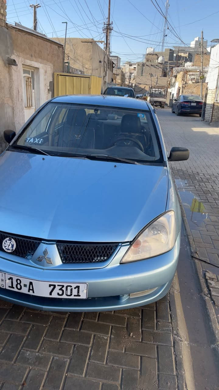 سلام عليكم لانسر ٢٠٠٥ مصبوغه عام ضربه بل جاملغ خلف الصدر بدون حض بدون دواخل كير محرك كفاله تبريد شغال 
سياره خير من الله سعر ٥٨ ورقه تجي تشوف سياره تعجبك وسهاله ***********مكان سياره بغداد كراده موجود كل الوقت وكفالة سياره من اي ضربه او عيب عده الي ذكرته
