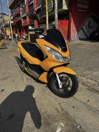 pcx لبيع جيل ثاني ياباني درجة مكفوله السعر ١٤ ورقة متواجد 07713176507
