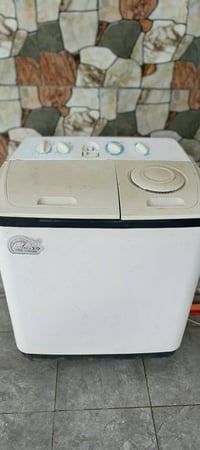 غسالة جديدة • غسل وتنشيف • مقعد غربي