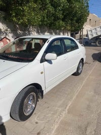كورلا ٢٠٠٣ مصبوغة حزام فقط مكفولة من الضربه ومن الخياس تبريد ثلج مكينه...