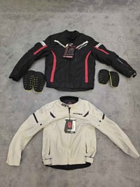 درع جديد • ابيض M • اسود XL