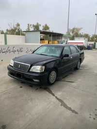 ٢٠٠١ • أسود • داخلية كريمية